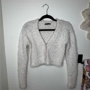 White faux fur Zara cardigan.